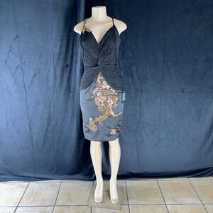Elegant Black Dress with Gold Embellishments